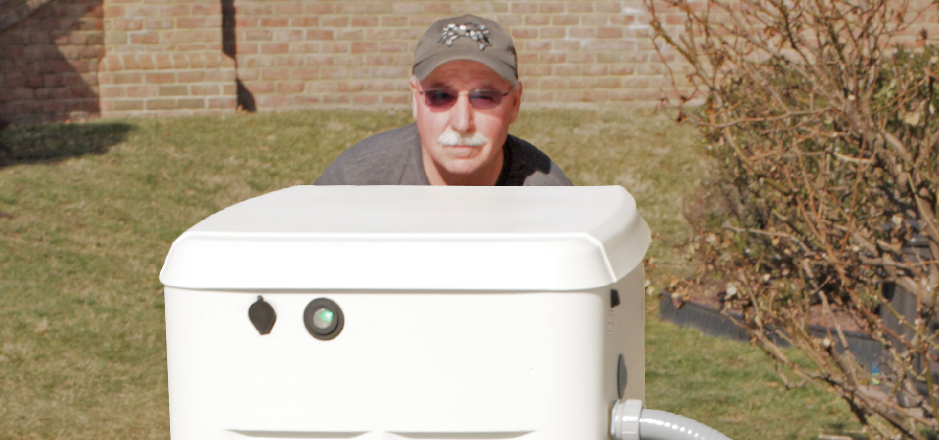 Five Star Power Systems owner Ken Kloster and a Five Star Power Systems electrician at home generator installation site
