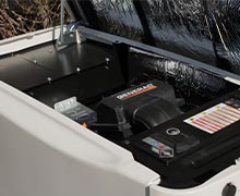 A look under the hood to the inside of a Generac home generator